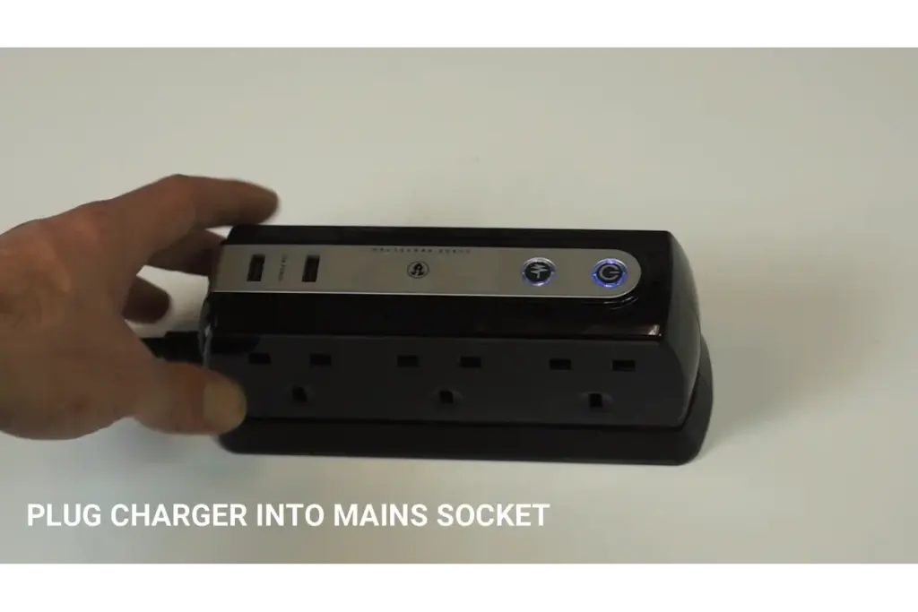 Plug Charger into mains socket